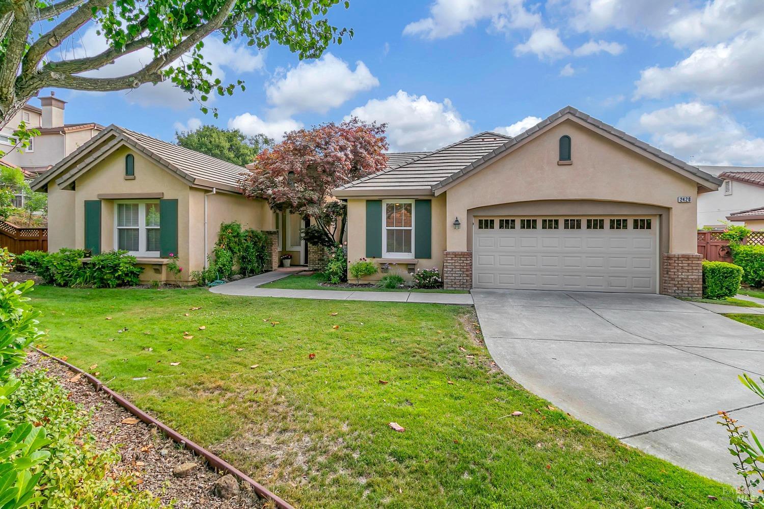 a view of outdoor space yard and front view of a house