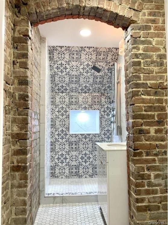 2301 Bathgate Avenue Bronx, NY 10458 - Photo 9 of 25 a bathroom with a shower