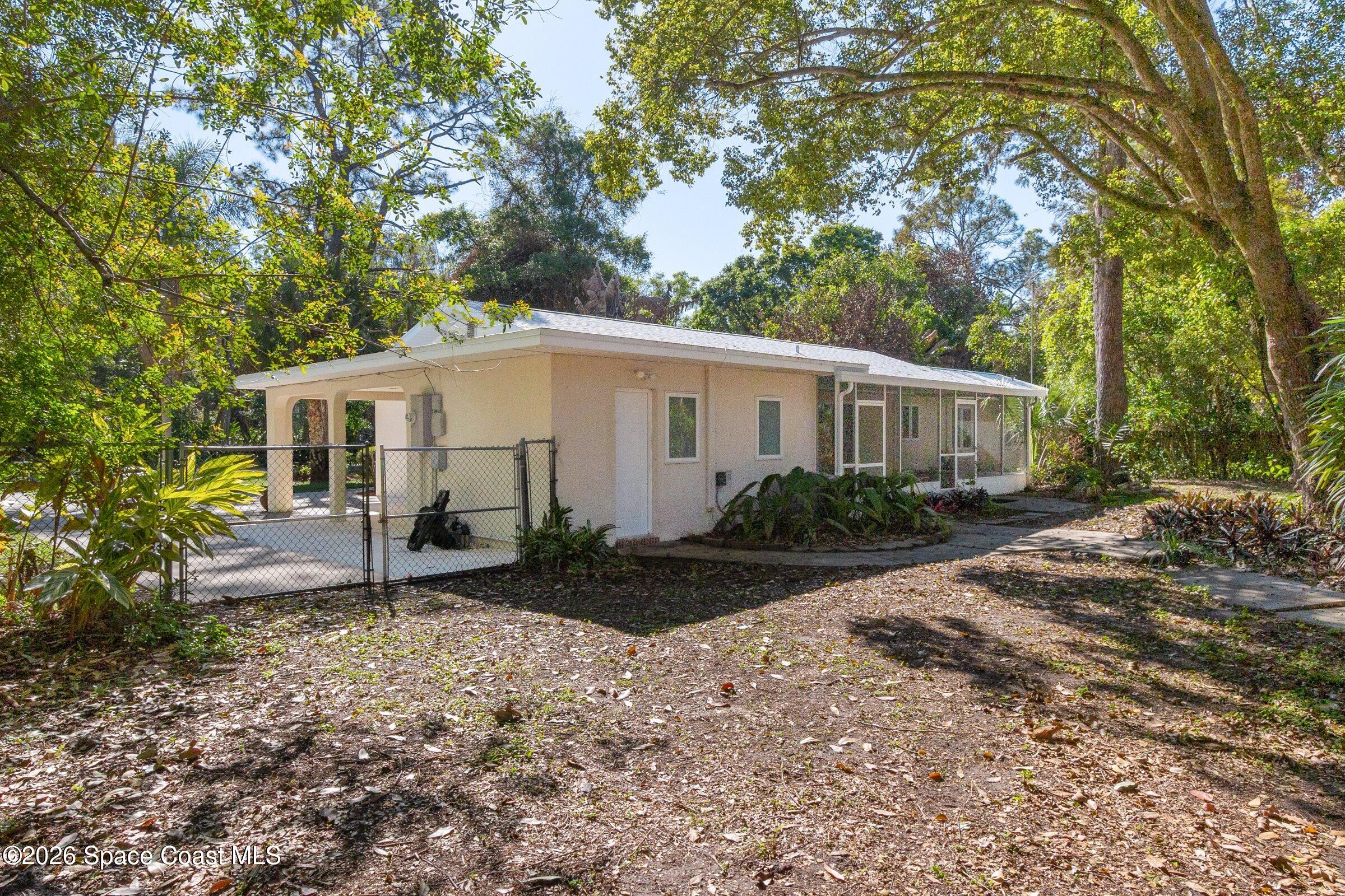 693 West Pine Road Melbourne Village, FL 32904 - Photo 32 of 65 38-693-W-Pine-Rear 1