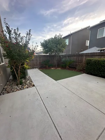 a house view with a outdoor space