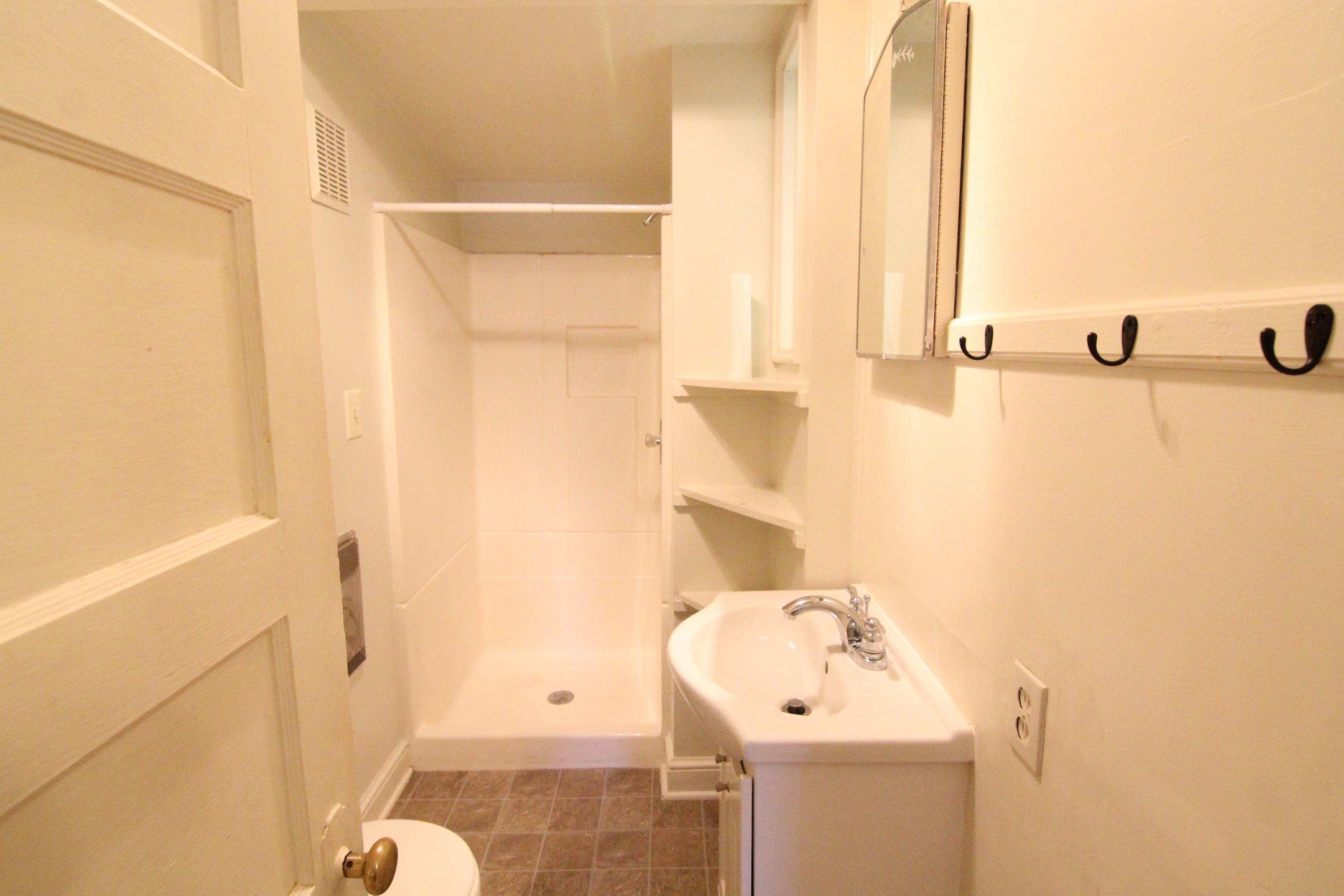 3655 Ventnor Road Southeast Roanoke, VA 24014 - Photo 11 of 27 a bathroom with a sink and shower