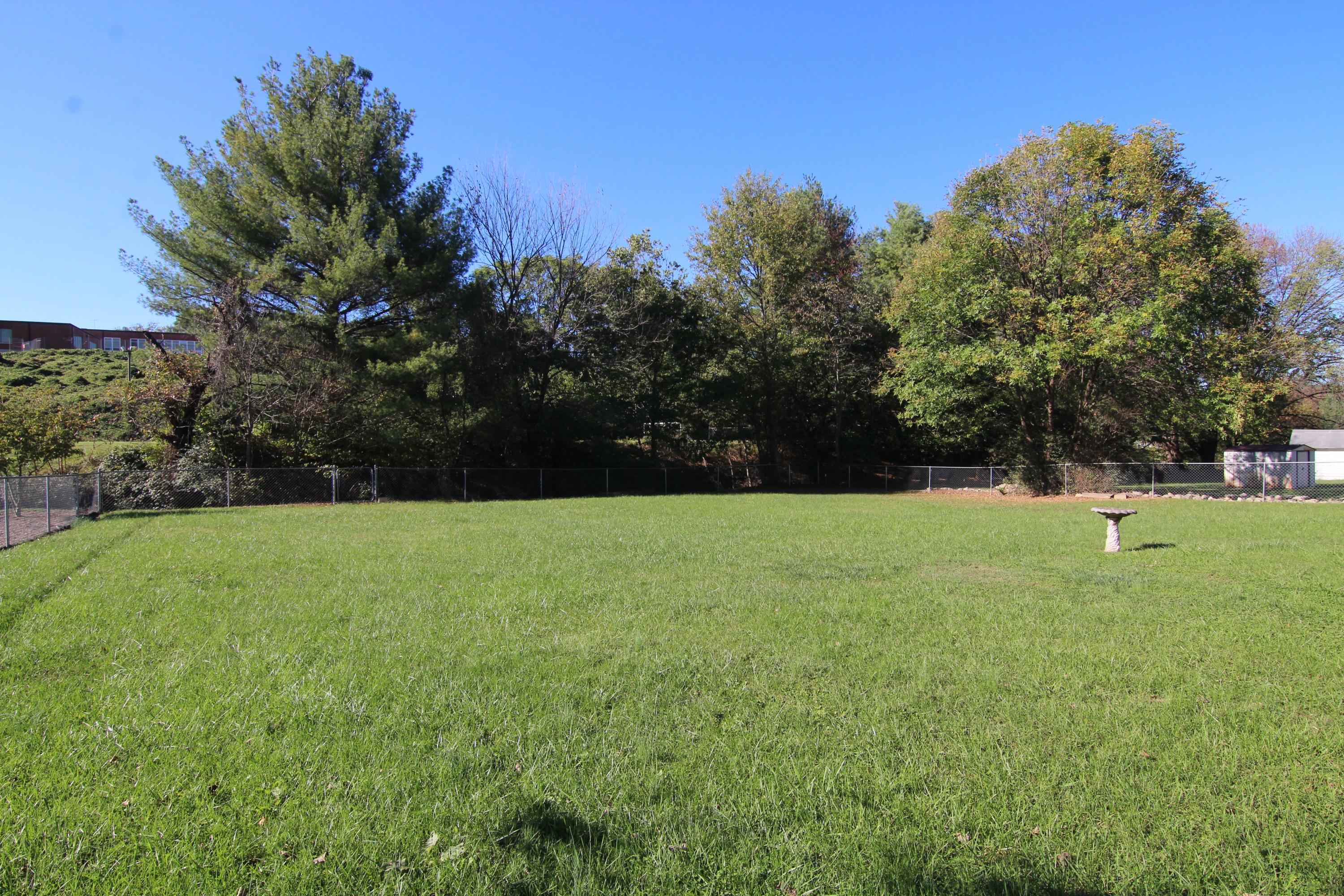 3655 Ventnor Road Southeast Roanoke, VA 24014 - Photo 27 of 27 a view of a field of grass and trees