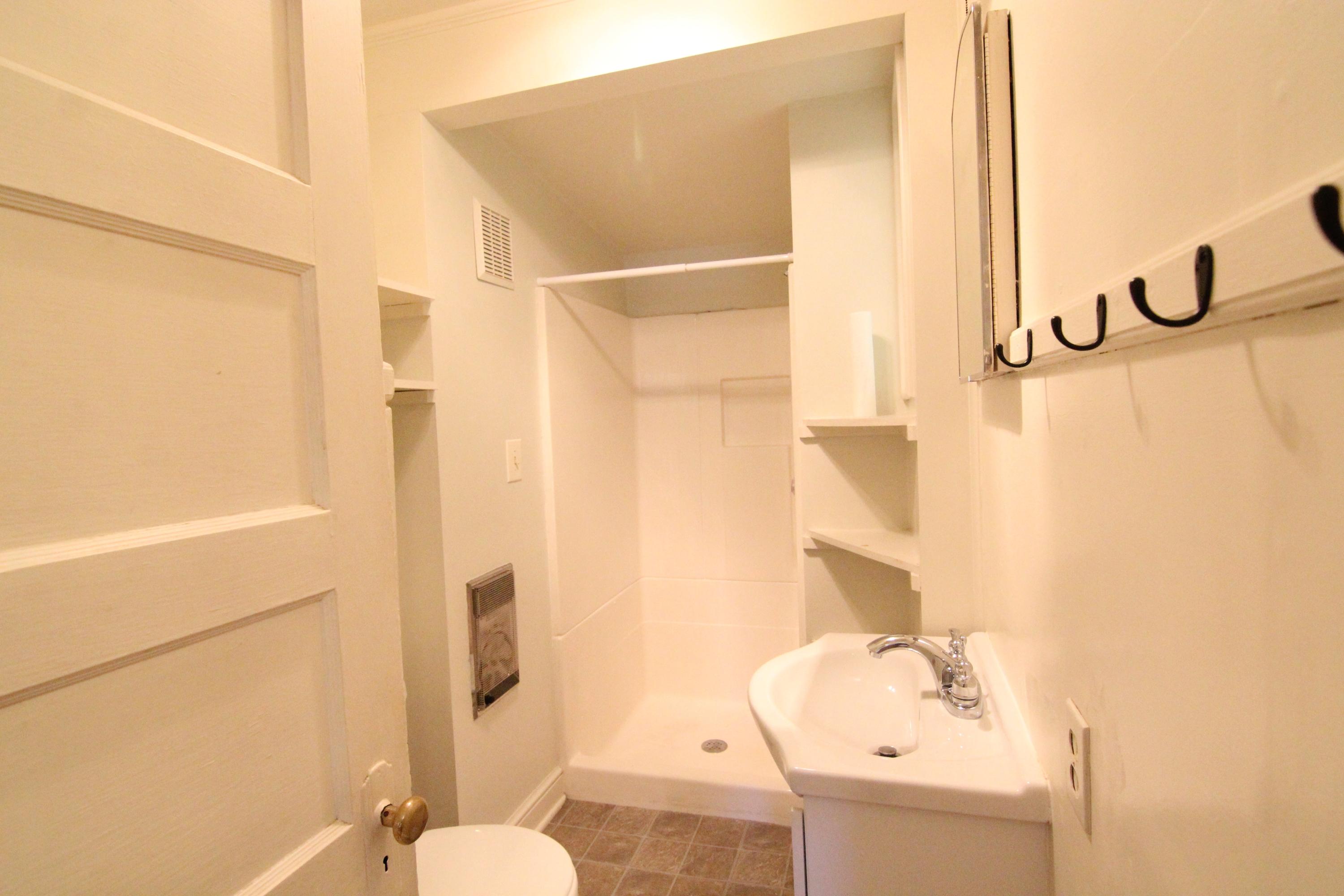 3655 Ventnor Road Southeast Roanoke, VA 24014 - Photo 10 of 27 a bathroom with a sink toilet and shower