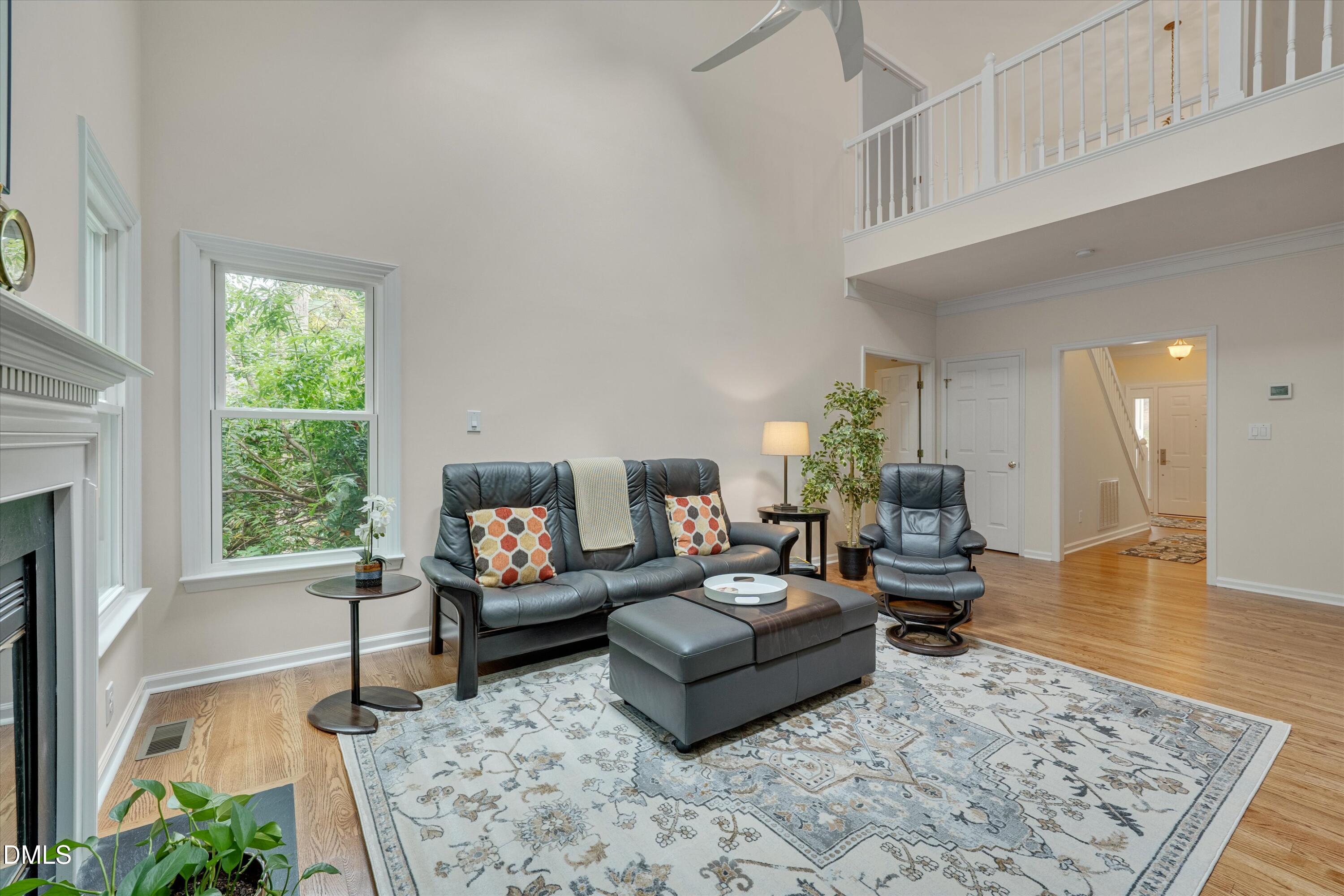205 Cates Farm Road Chapel Hill, NC 27516 - Photo 13 of 56 a living room with furniture and a rug