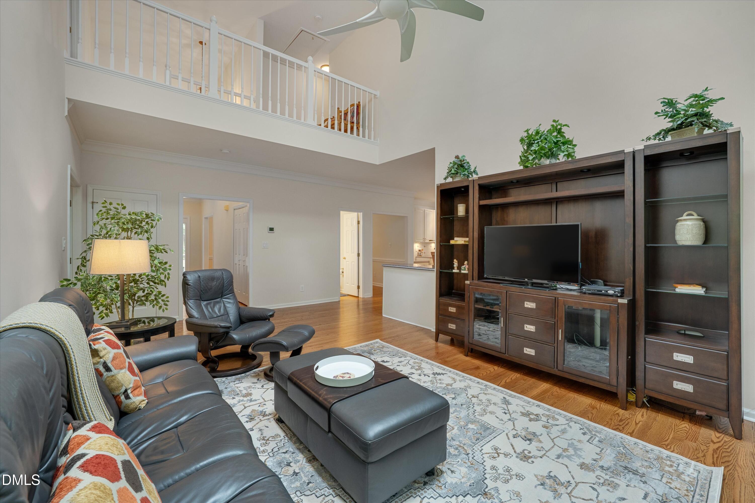 205 Cates Farm Road Chapel Hill, NC 27516 - Photo 14 of 56 a living room with furniture and a flat screen tv