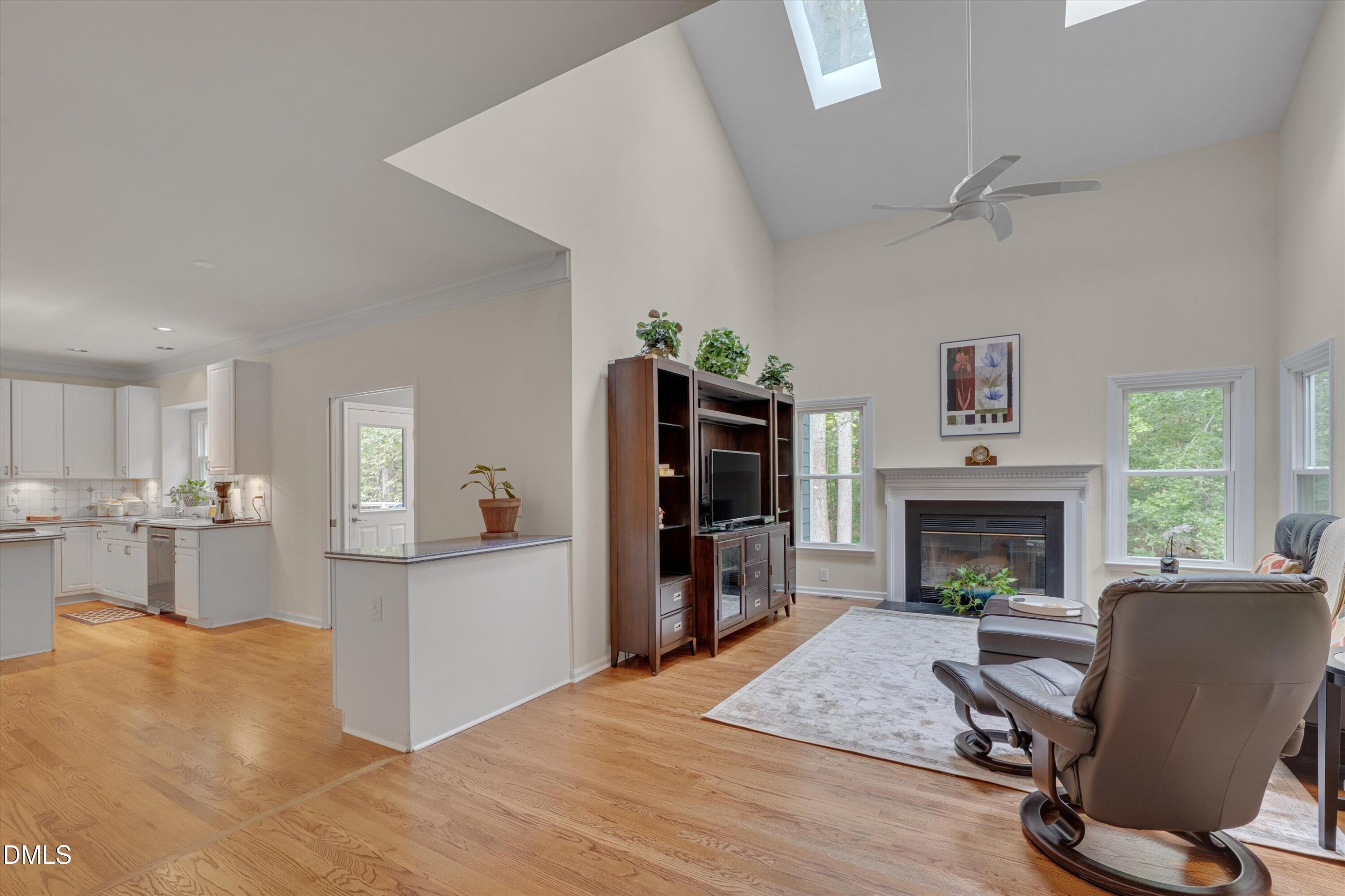 205 Cates Farm Road Chapel Hill, NC 27516 - Photo 15 of 56 a living room with furniture and a fireplace