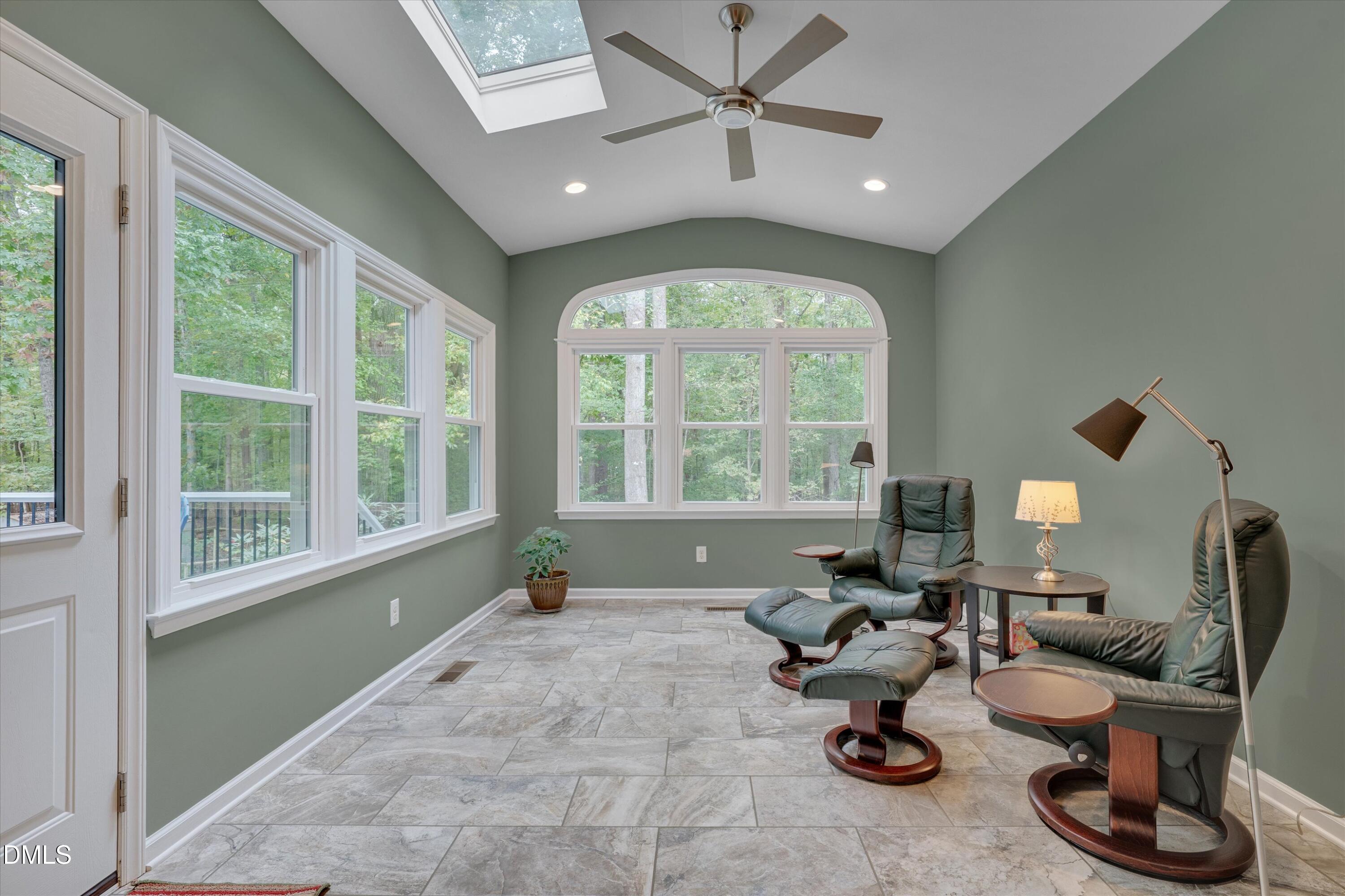 205 Cates Farm Road Chapel Hill, NC 27516 - Photo 20 of 56 a living room with furniture and a large window