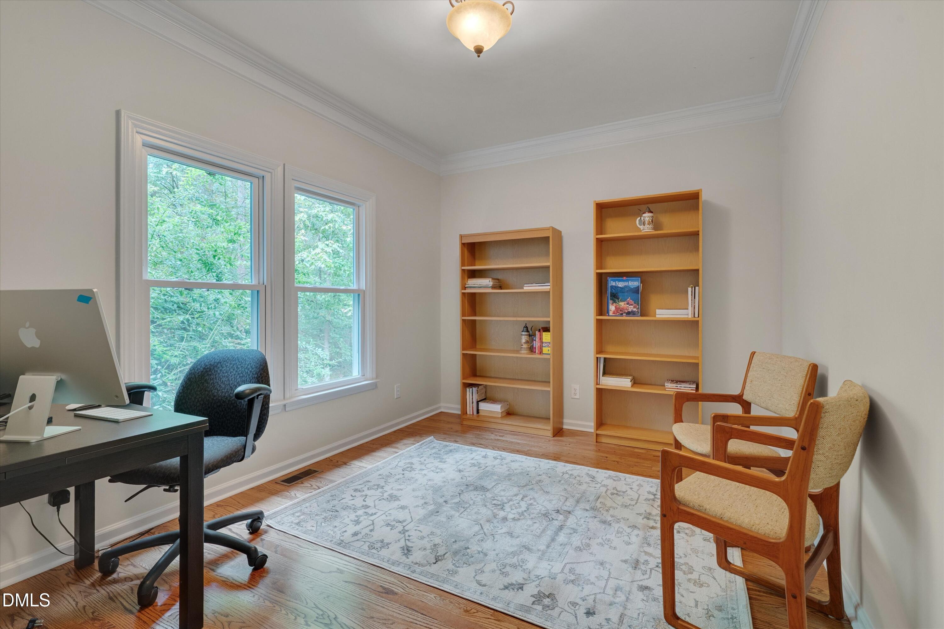205 Cates Farm Road Chapel Hill, NC 27516 - Photo 22 of 56 a view of a workspace with furniture and a window
