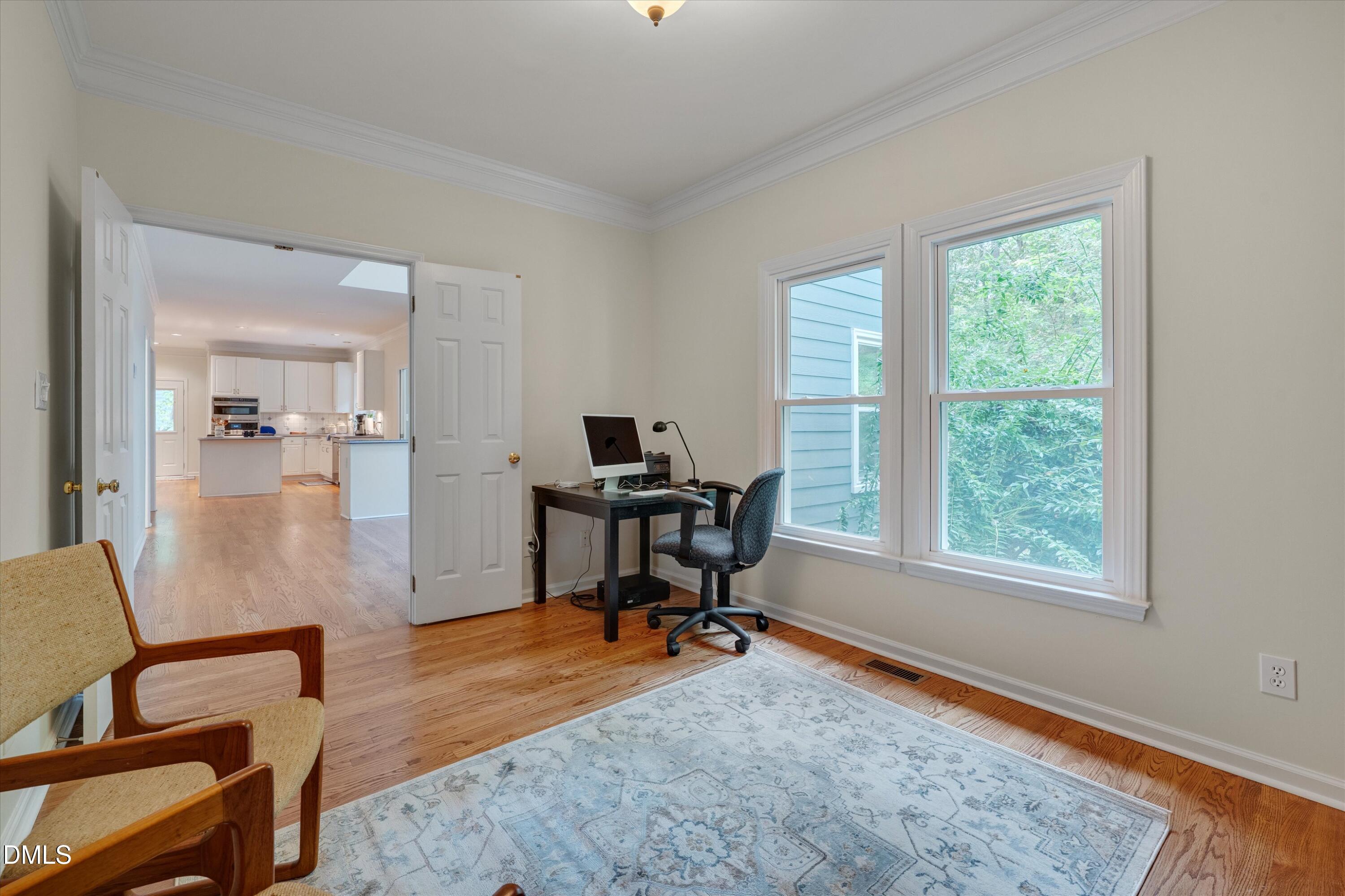205 Cates Farm Road Chapel Hill, NC 27516 - Photo 23 of 56 a view of a workspace with furniture and a window