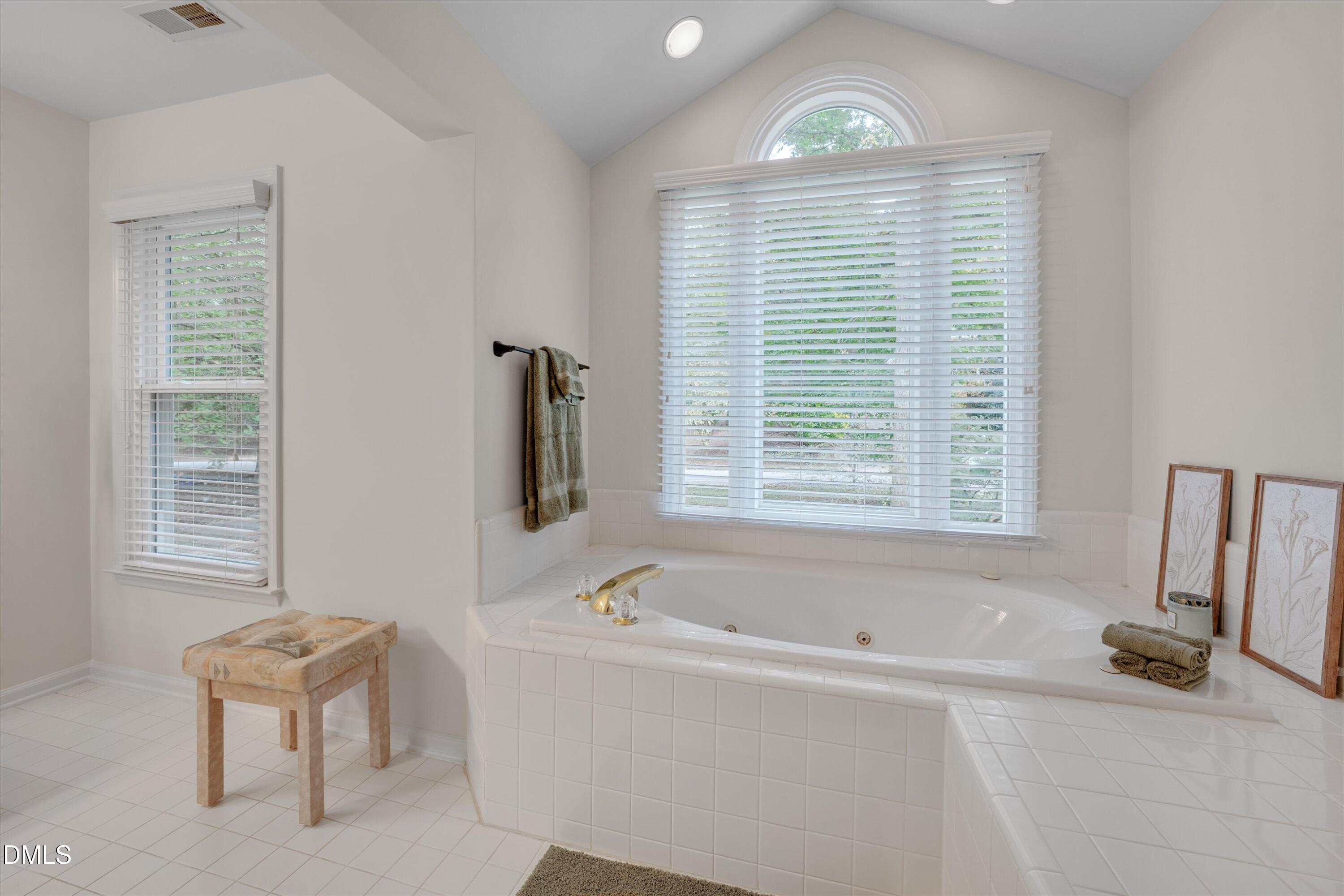 205 Cates Farm Road Chapel Hill, NC 27516 - Photo 34 of 56 a white bath tub sitting next to a window