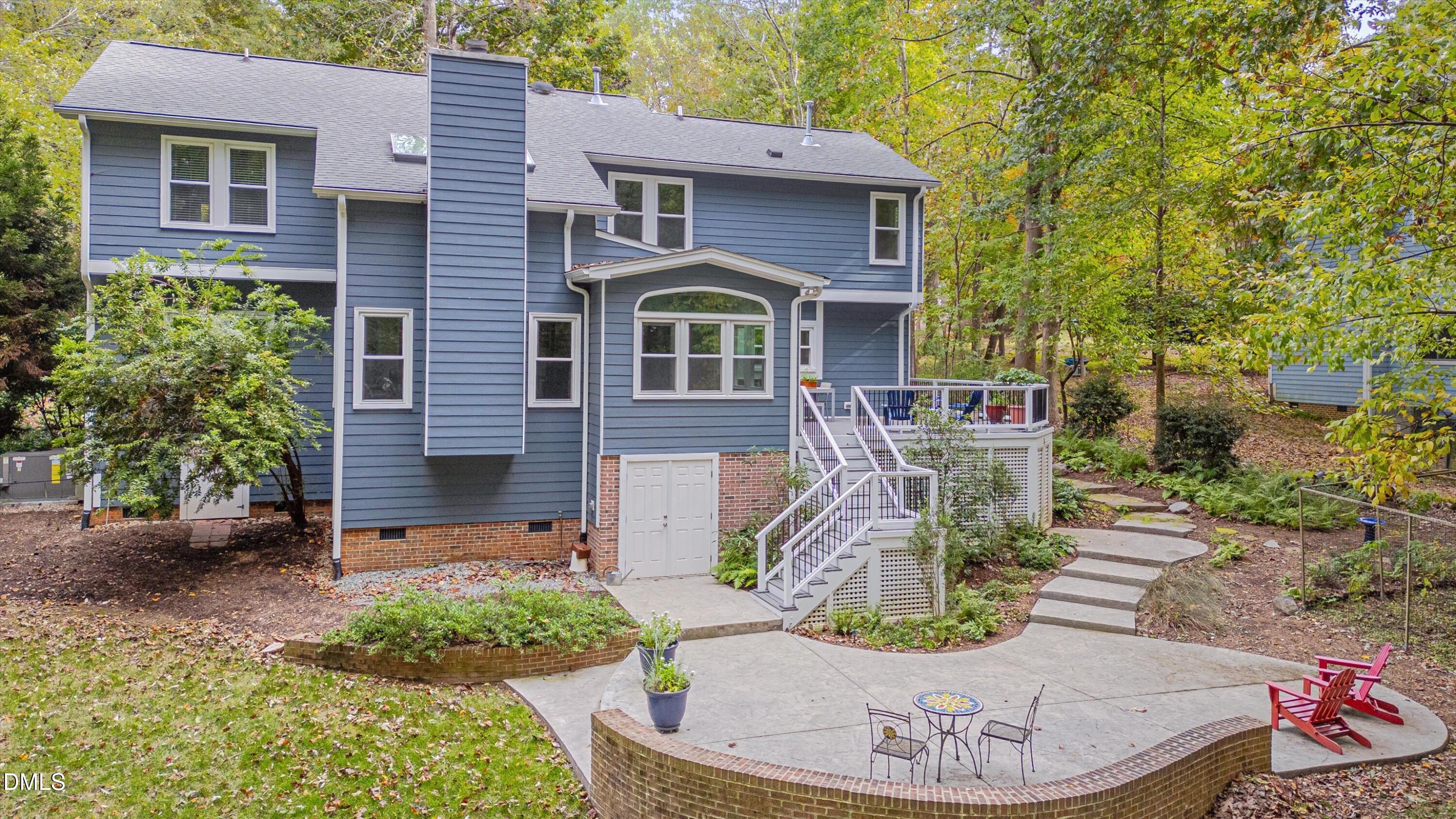 205 Cates Farm Road Chapel Hill, NC 27516 - Photo 48 of 56 a front view of a house with a yard