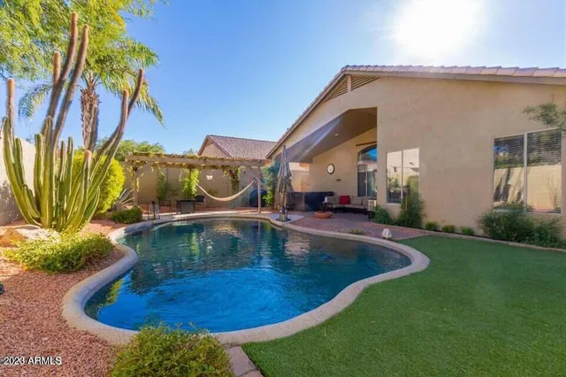 a view of outdoor space swimming pool and patio