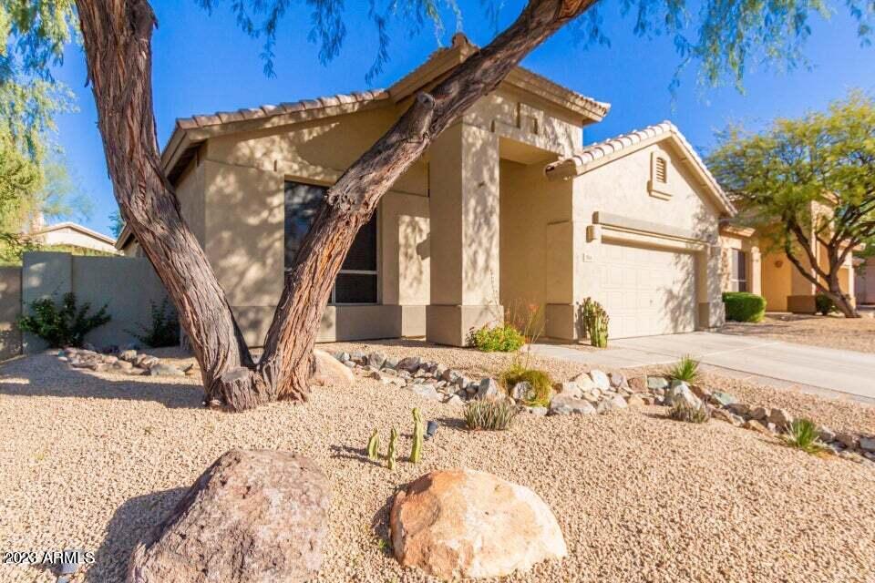 7514 East Wingspan Way Scottsdale, AZ 85255 - Photo 2 of 18 a view of a house with snow on the background