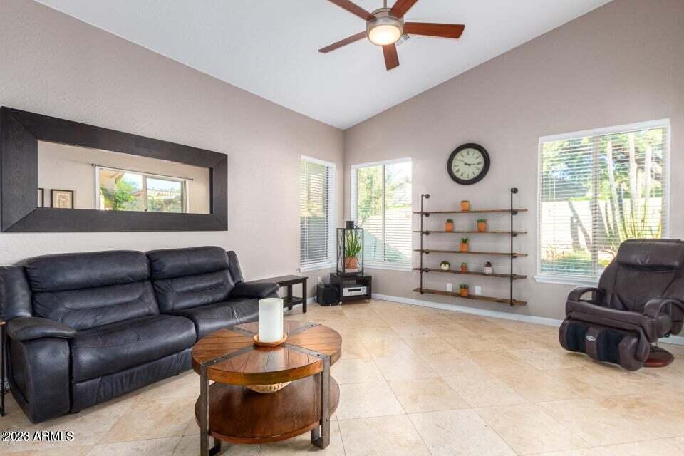 7514 East Wingspan Way Scottsdale, AZ 85255 - Photo 7 of 18 a living room with furniture and a large window