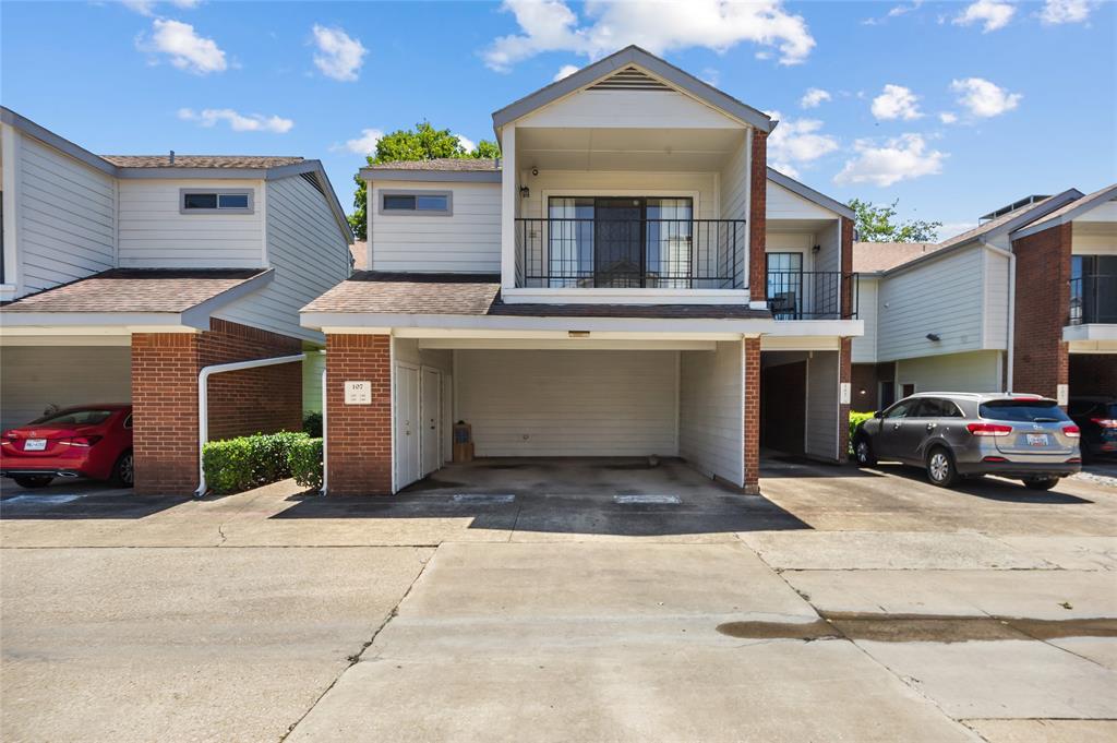 5100 Verde Valley Lane, Unit 245 Dallas, TX 75254 - Photo 2 of 24 a view of a car parked in front of a building