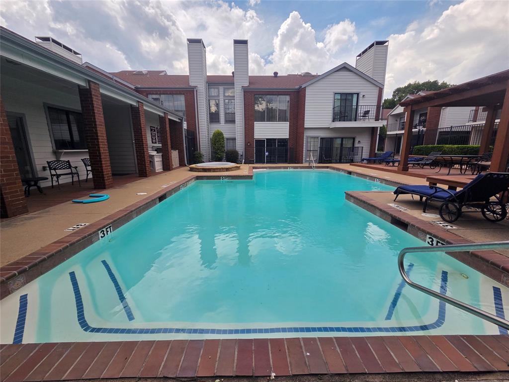 5100 Verde Valley Lane, Unit 245 Dallas, TX 75254 - Photo 23 of 24 a view of a patio with chair and tables
