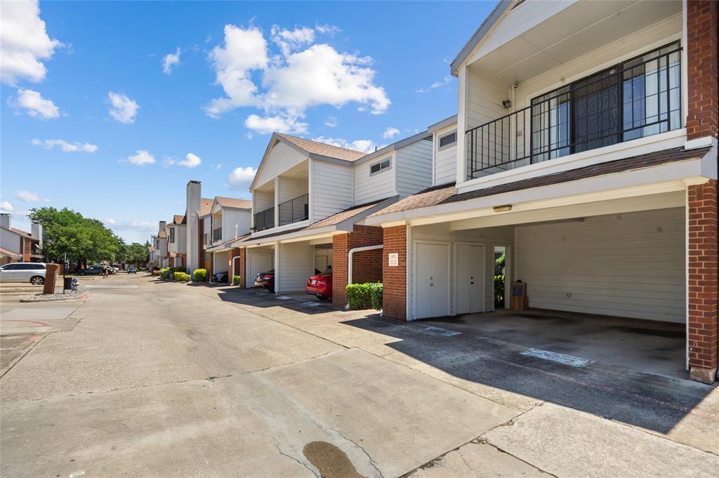 5100 Verde Valley Lane, Unit 245 Dallas, TX 75254 - Photo 4 of 24 a view of a building with a street