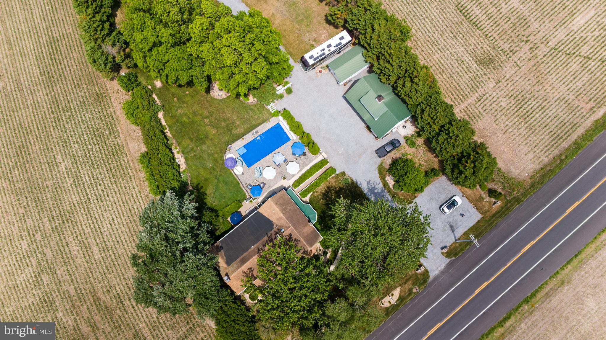 26285 Broadkill Road Milton, DE 19968 - Photo 90 of 98 Aerial View of Poolside & Road Access
