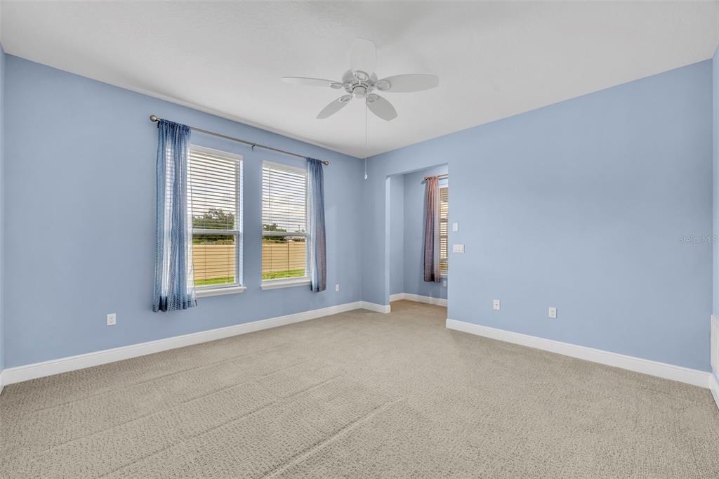134 Silver Maple Road Groveland, FL 34736 - Photo 27 of 73 a view of an empty room with a window
