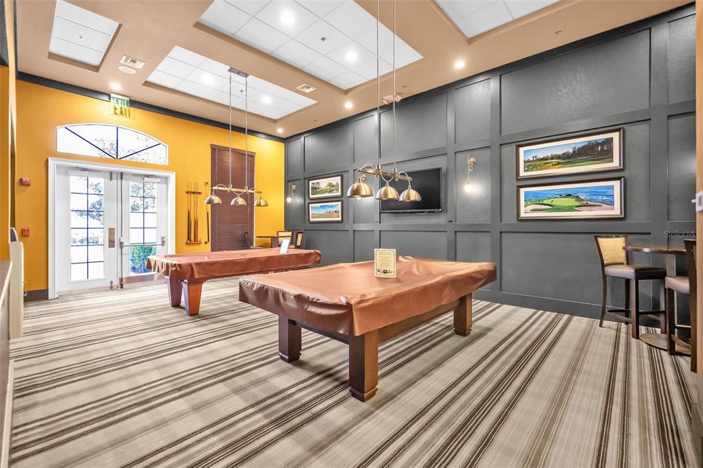 134 Silver Maple Road Groveland, FL 34736 - Photo 52 of 73 a living room with furniture a rug and a table