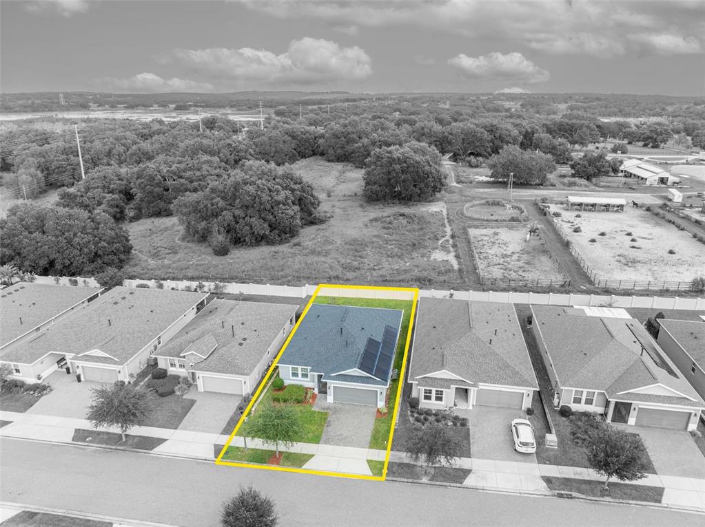 134 Silver Maple Road Groveland, FL 34736 - Photo 60 of 73 an aerial view of residential houses with outdoor space