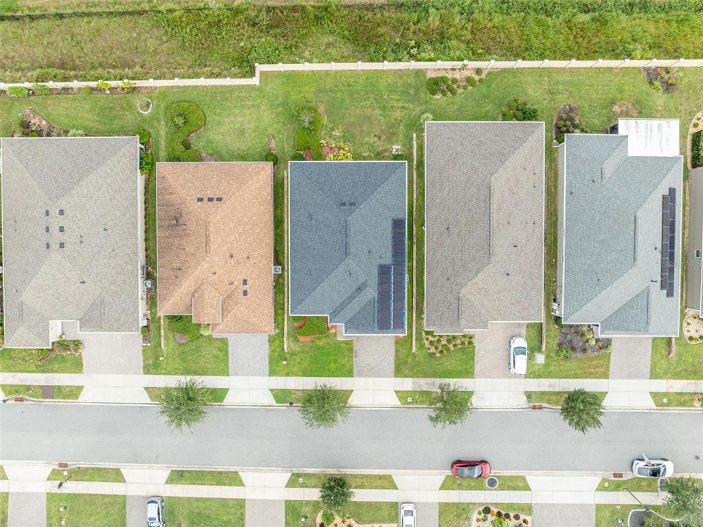 134 Silver Maple Road Groveland, FL 34736 - Photo 67 of 73 an aerial view of residential houses with outdoor space and swimming pool