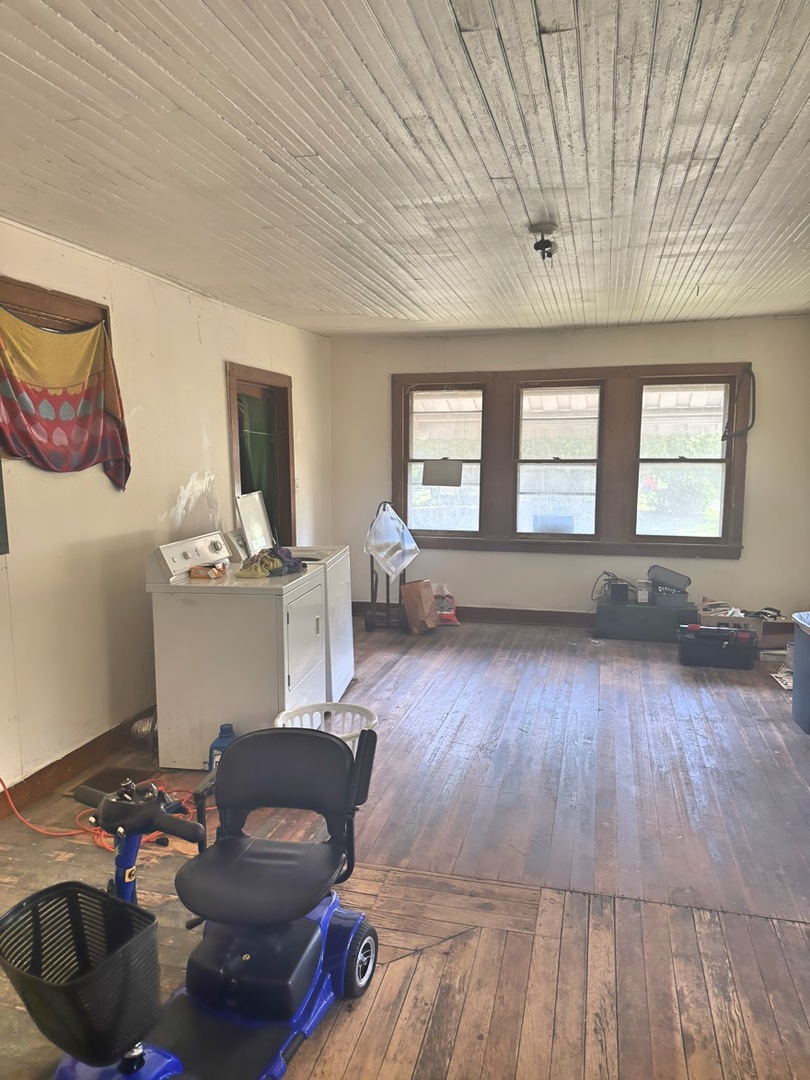 313 North 5th Street Watseka, IL 60970 - Photo 7 of 16 a living room with furniture and a wooden floor