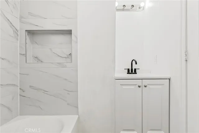 a bathroom with a bathtub