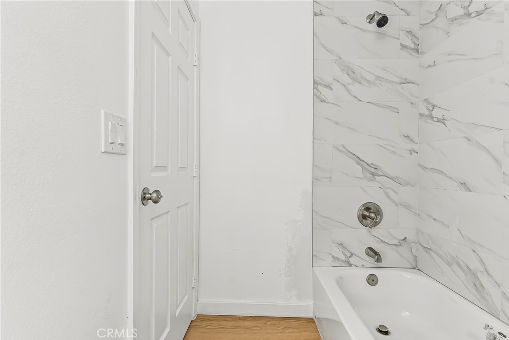 129 North K Street Needles, CA 92363 - Photo 20 of 39 a bathroom with a bathtub