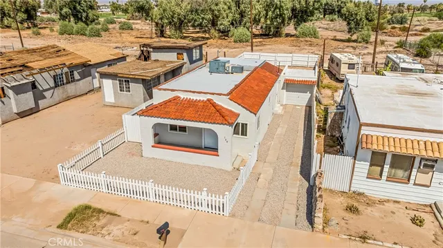 a terrace of a house with wooden floor