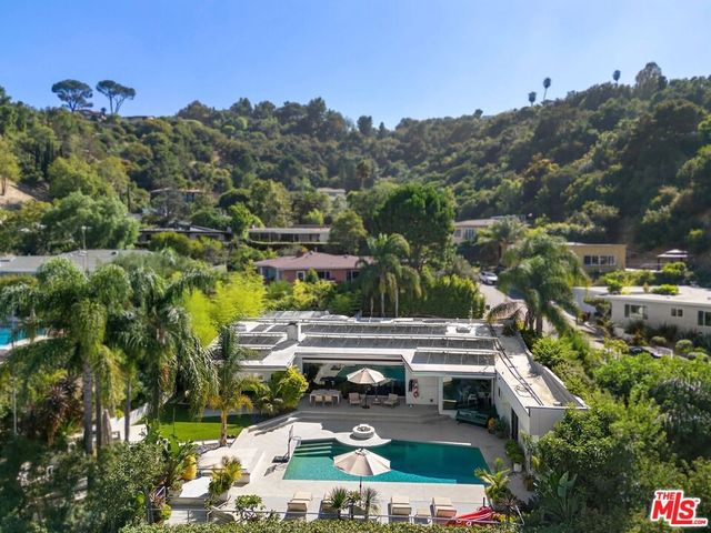 a view of a house with a garden