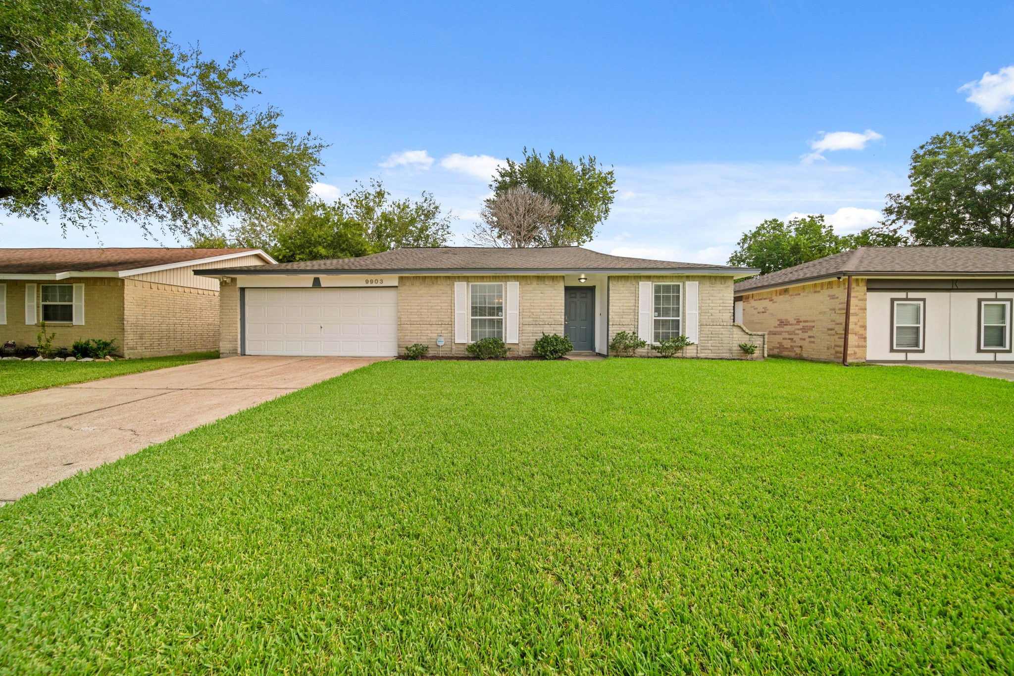 9903 Robin Street La Porte, TX 77571 - Photo 1 of 25 a view of house with a big yard and potted plants