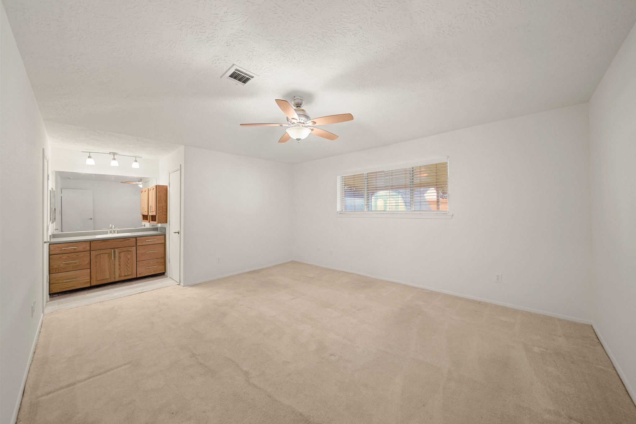 9903 Robin Street La Porte, TX 77571 - Photo 13 of 25 a view of an empty room with a window