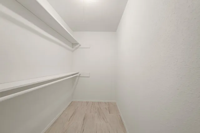 a view of small space with racks on the wall