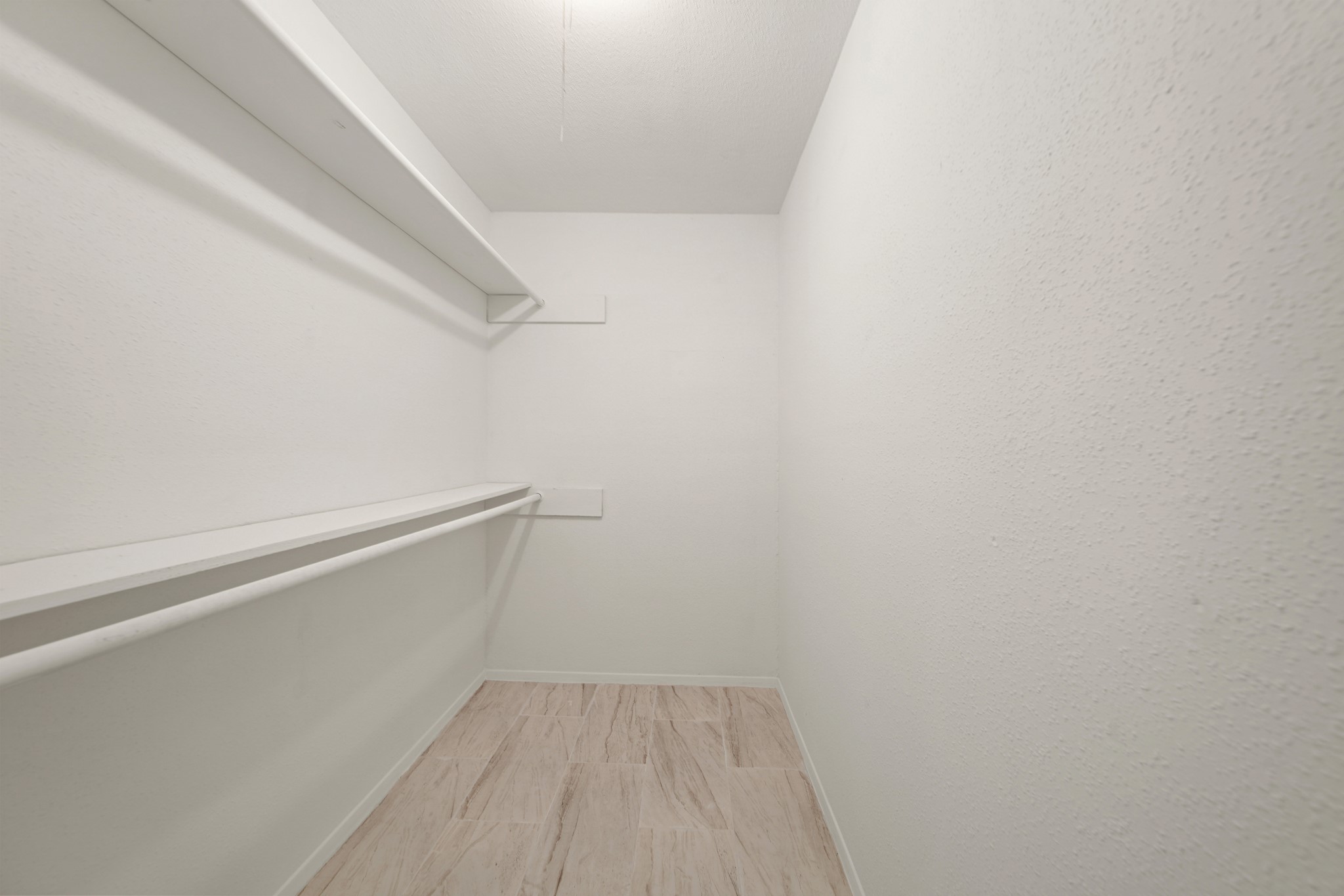 9903 Robin Street La Porte, TX 77571 - Photo 17 of 25 a view of small space with racks on the wall