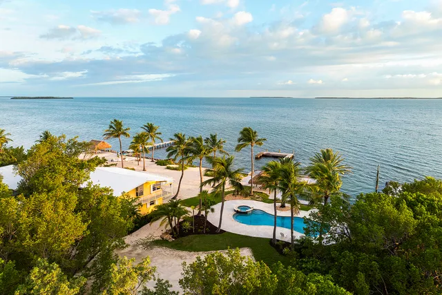 a view of a lake with a yard