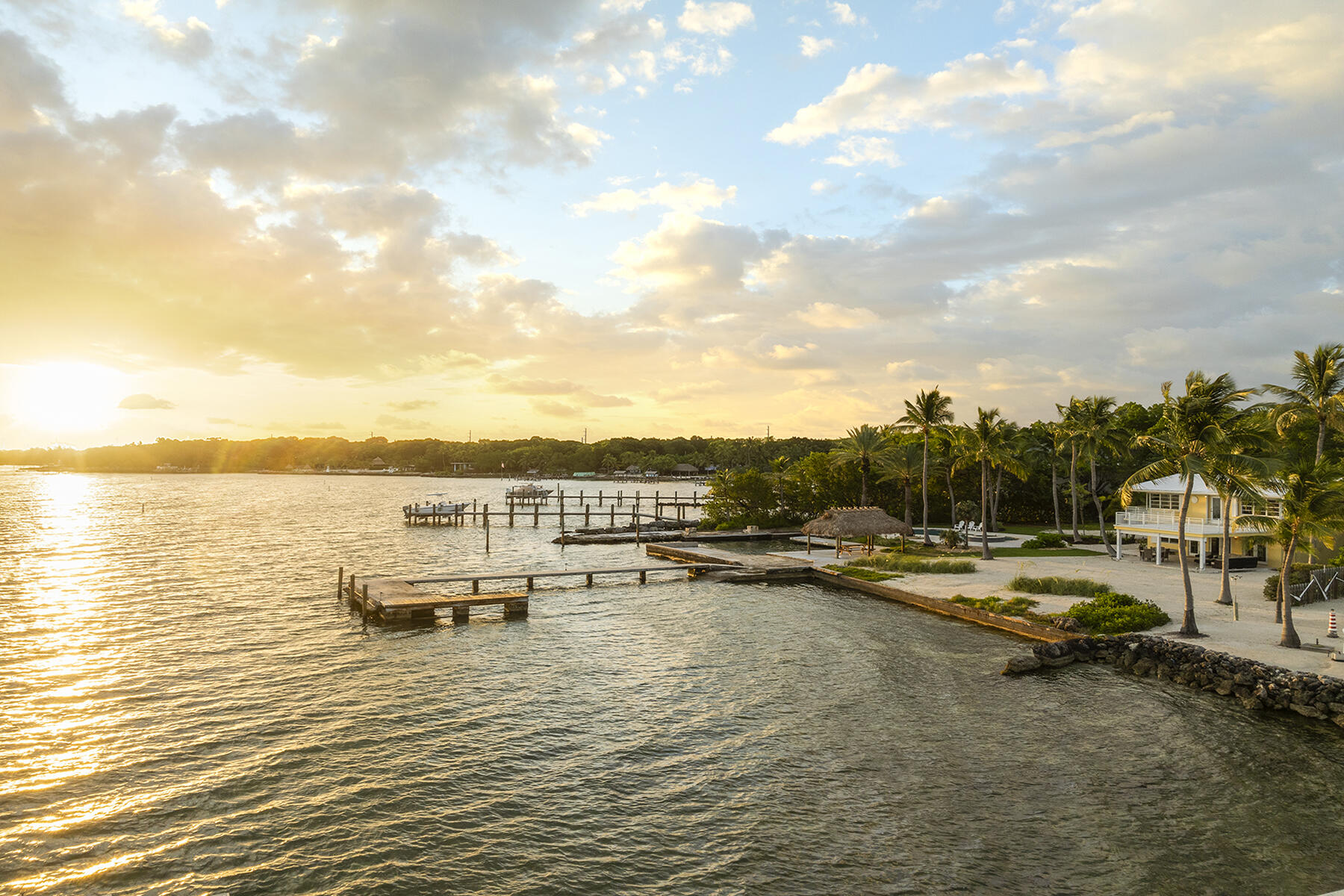 36 Sunset Road Key Largo, FL 33037 - Photo 26 of 55 a view of a lake with boats and trees