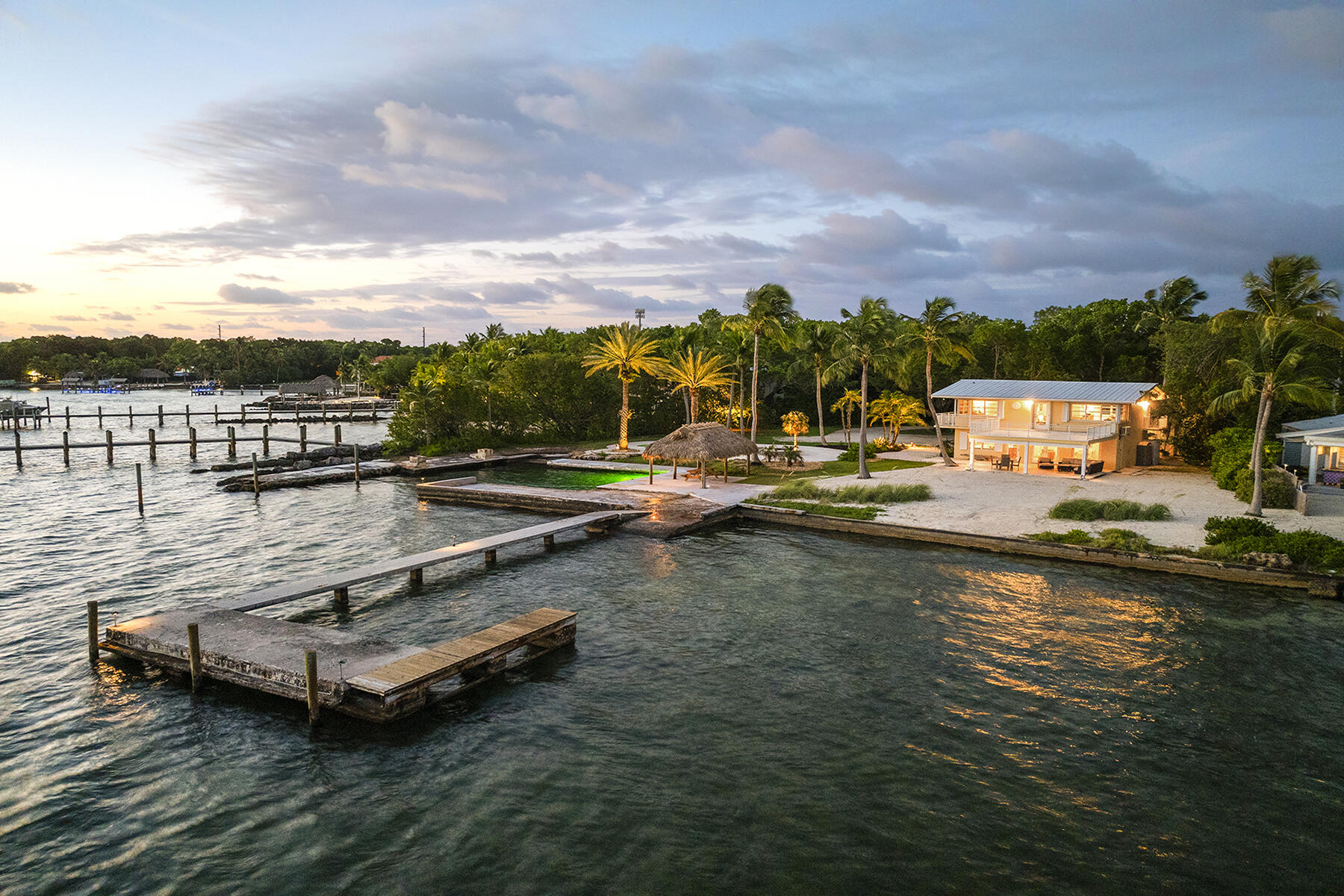 36 Sunset Road Key Largo, FL 33037 - Photo 27 of 55 a view of a lake with boats and trees