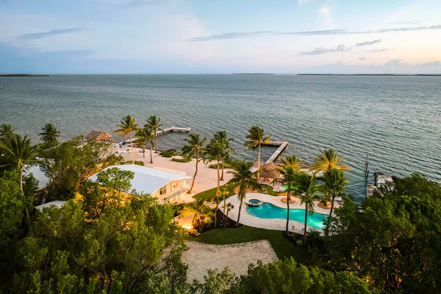 a living room with fireplace furniture and a flat screen tv