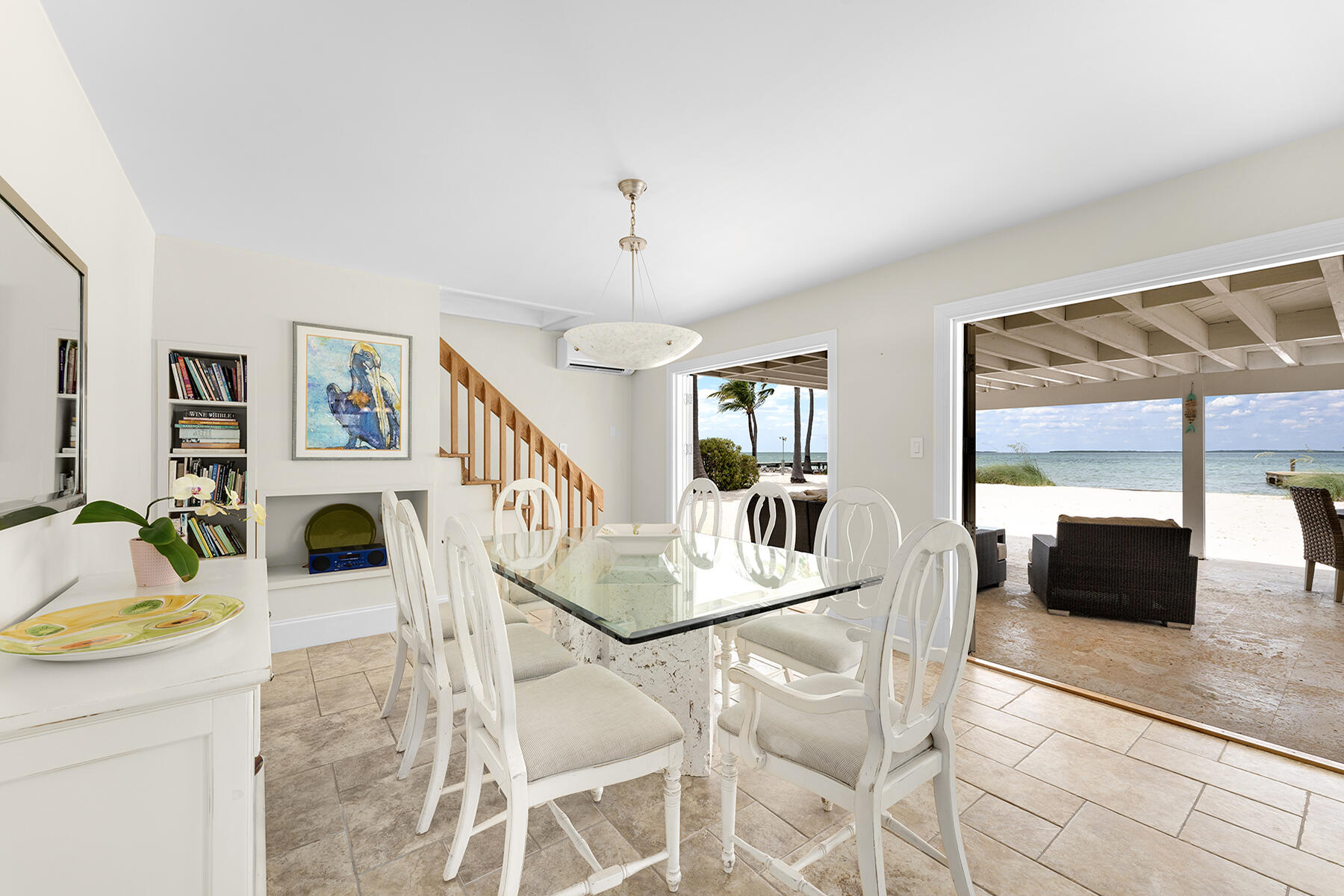 36 Sunset Road Key Largo, FL 33037 - Photo 32 of 55 a living room with fireplace furniture and a flat screen tv