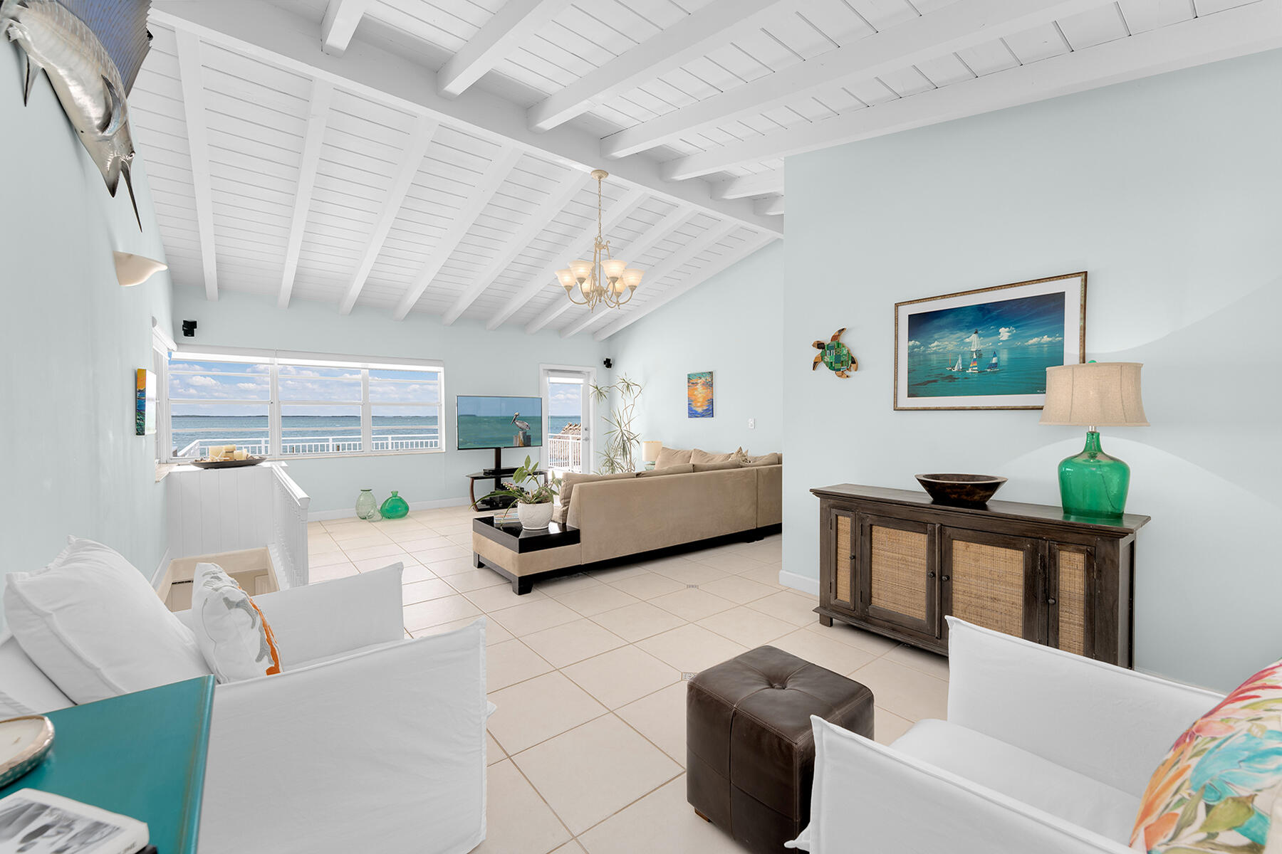 36 Sunset Road Key Largo, FL 33037 - Photo 35 of 55 a living room with furniture and a wooden floor