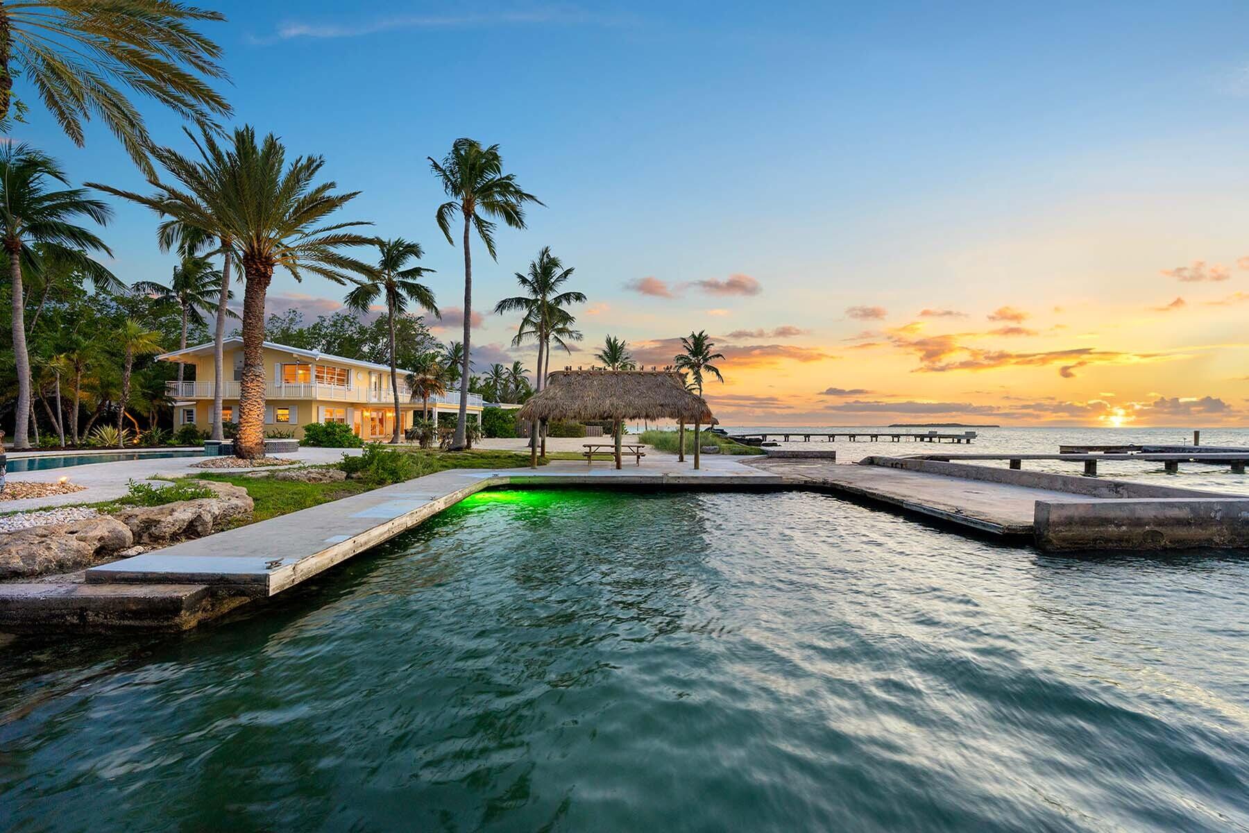 36 Sunset Road Key Largo, FL 33037 - Photo 51 of 55 a view of a lake with houses