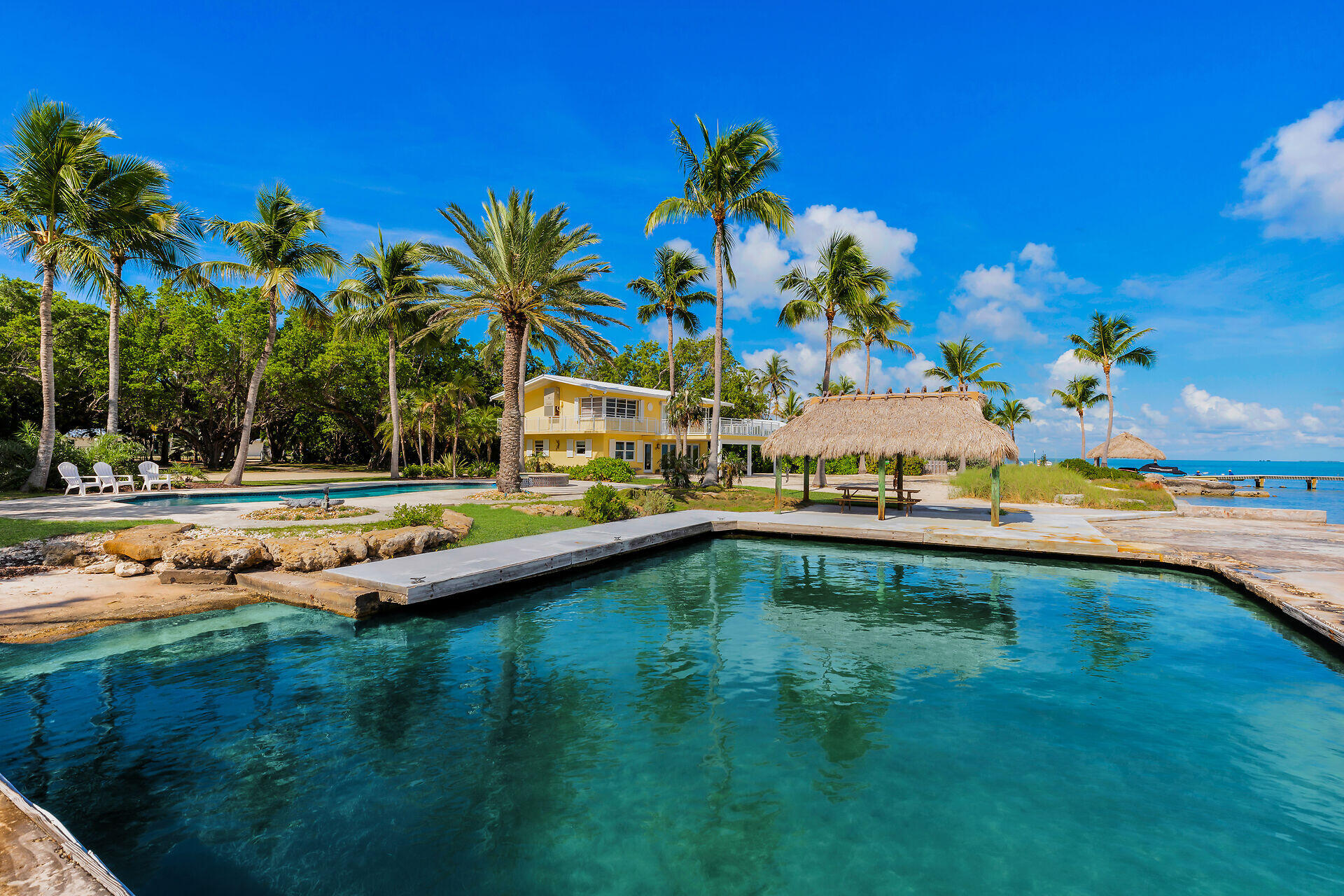36 Sunset Road Key Largo, FL 33037 - Photo 7 of 55 a view of swimming pool with outdoor seating and deck