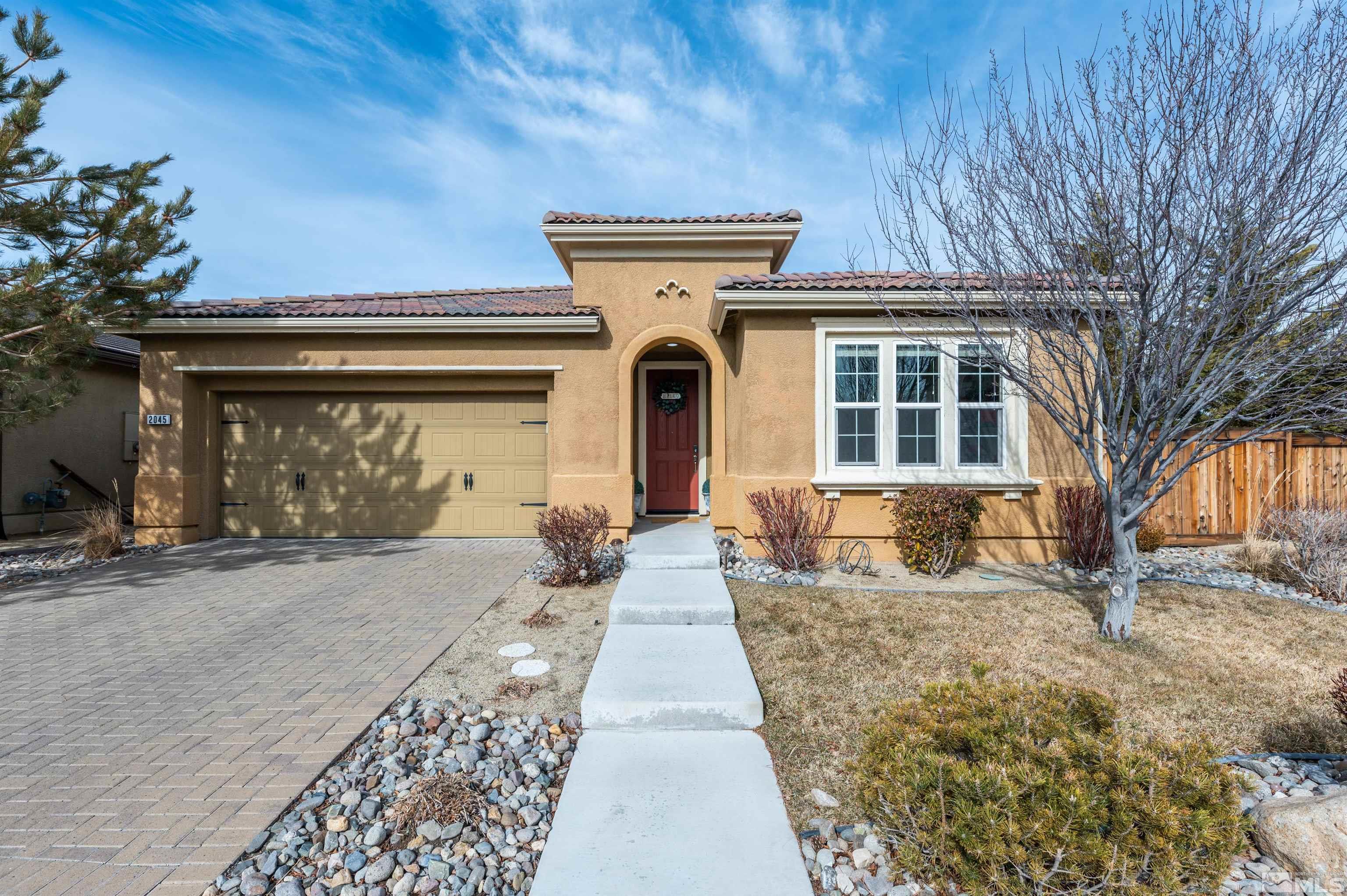 front view of a house with a pathway