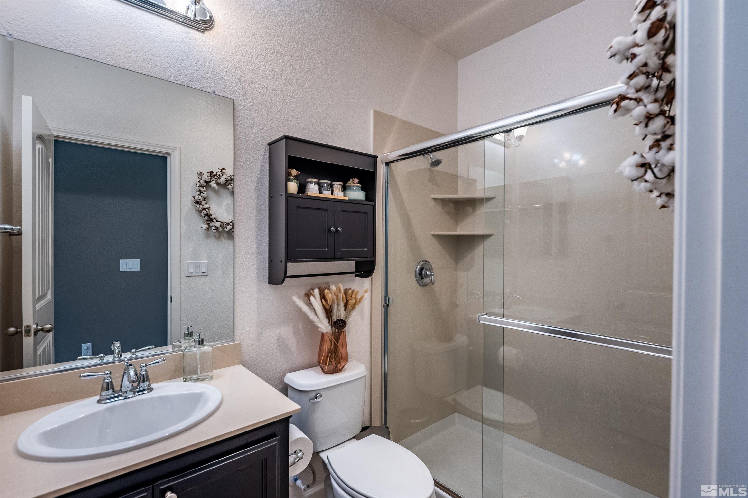 2045 Tawleed Road Reno, NV 89521 - Photo 21 of 33 a bathroom with a sink toilet and shower