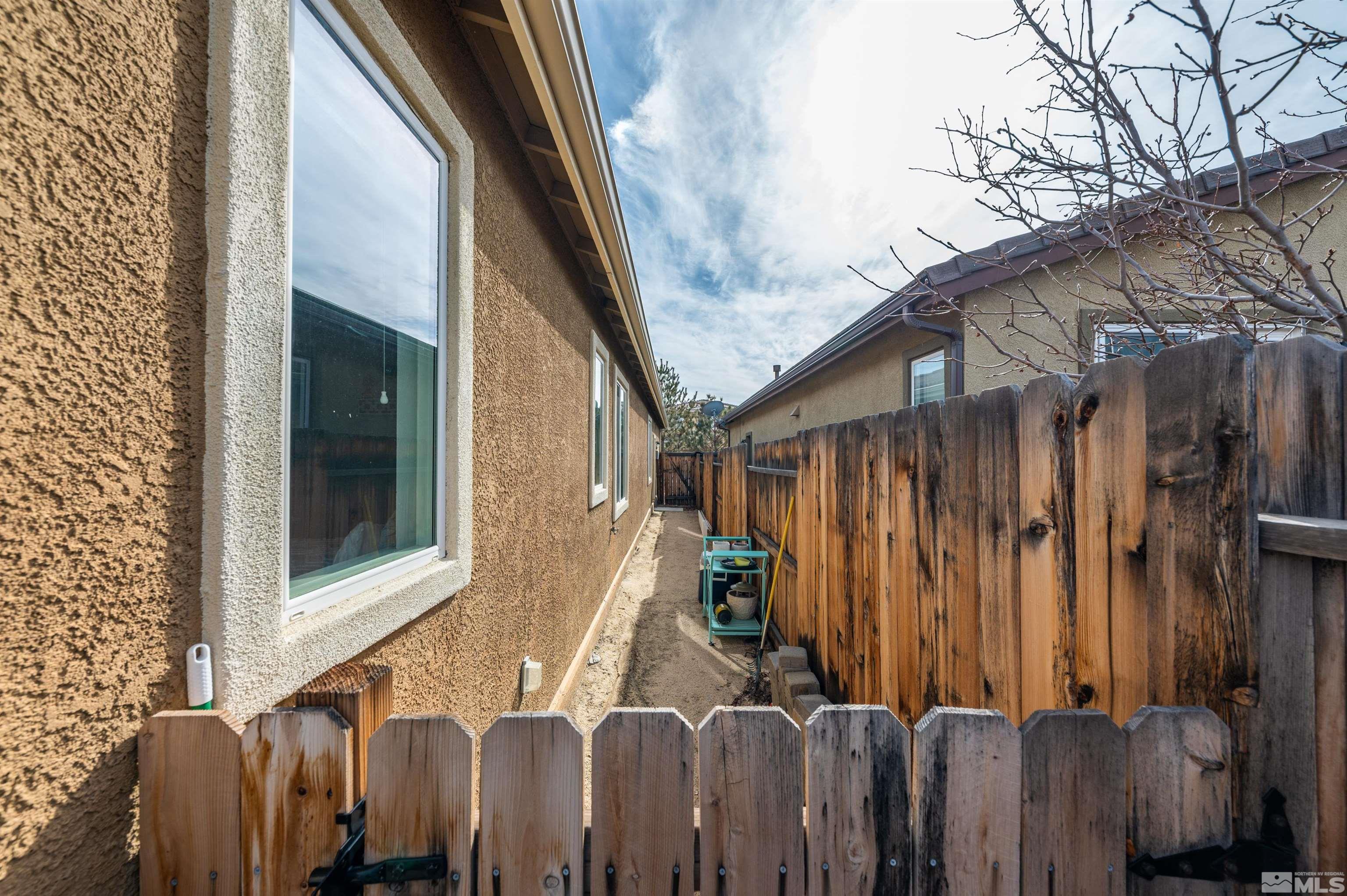 2045 Tawleed Road Reno, NV 89521 - Photo 31 of 33 a view of a house with a backyard