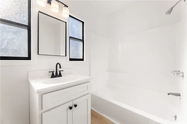 a bathroom with a sink and a bathtub