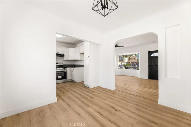 a view of a kitchen with a sink and a stove