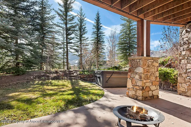 a view of swimming pool with a patio