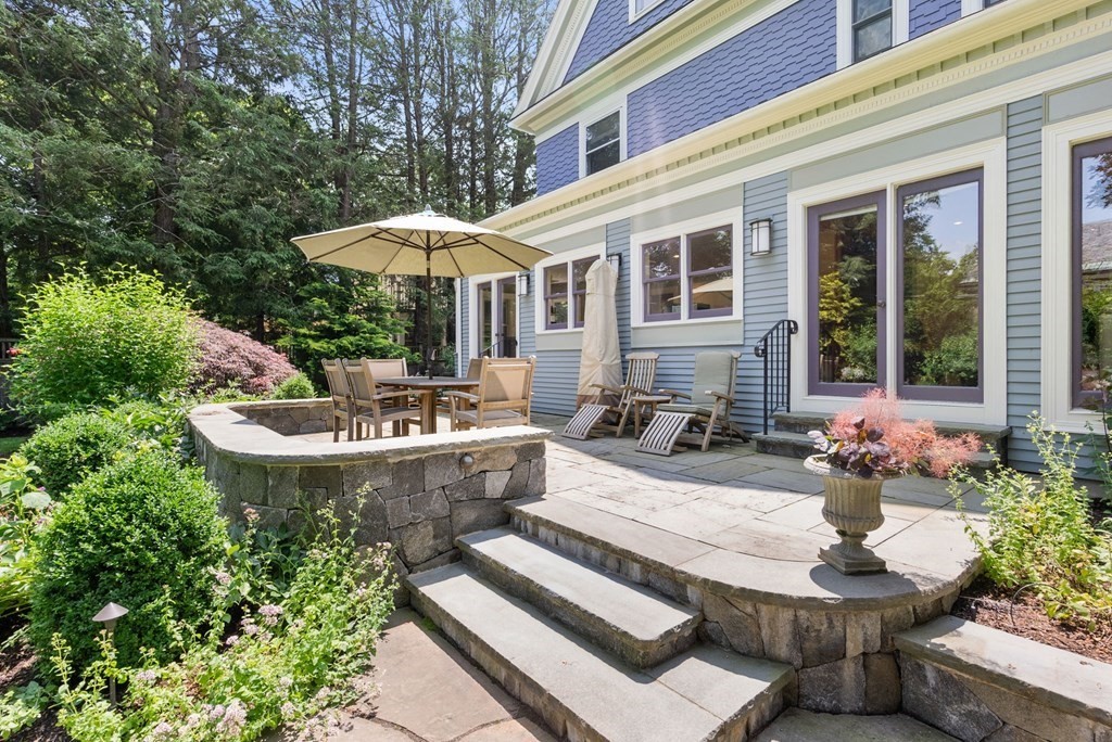 28 Monadnock Road Newton, MA 02467 - Photo 17 of 23 a front view of a house with a fountain and a fountain